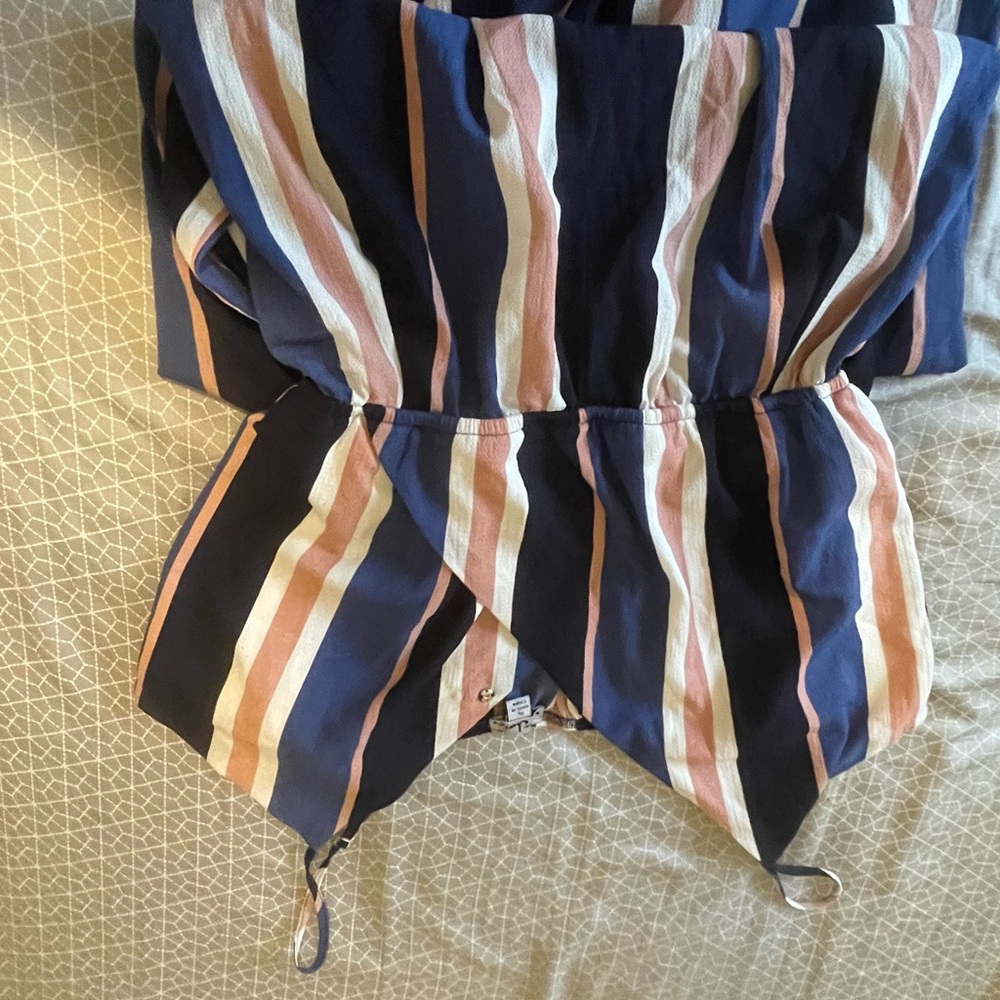 Blue, white, pink jumpsuit.